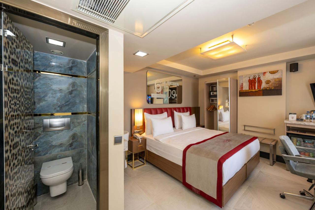 Ramada By Wyndham Istanbul Pera Taksim Hotel Exterior photo A room at the hotel