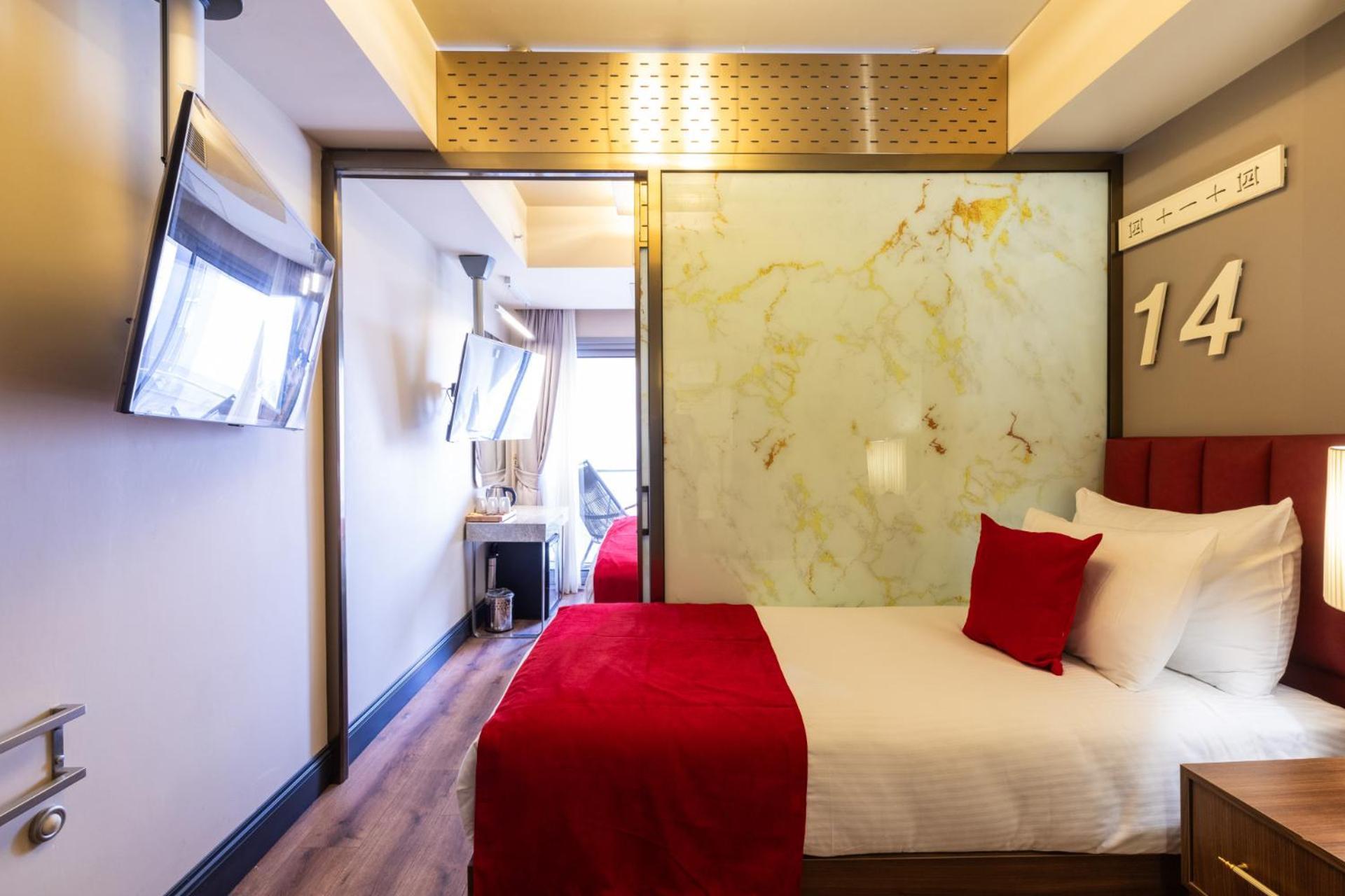 Ramada By Wyndham Istanbul Pera Taksim Hotel Exterior photo The interior of a room at the hotel